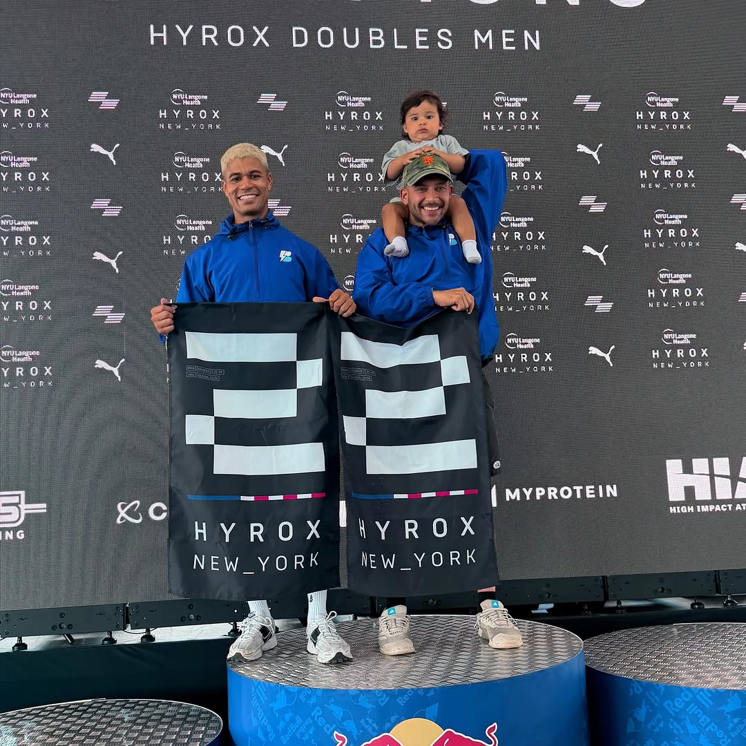 Coach Josh and Coach Sebastian on the podium at HYROX NYC 2026 Men's Doubles