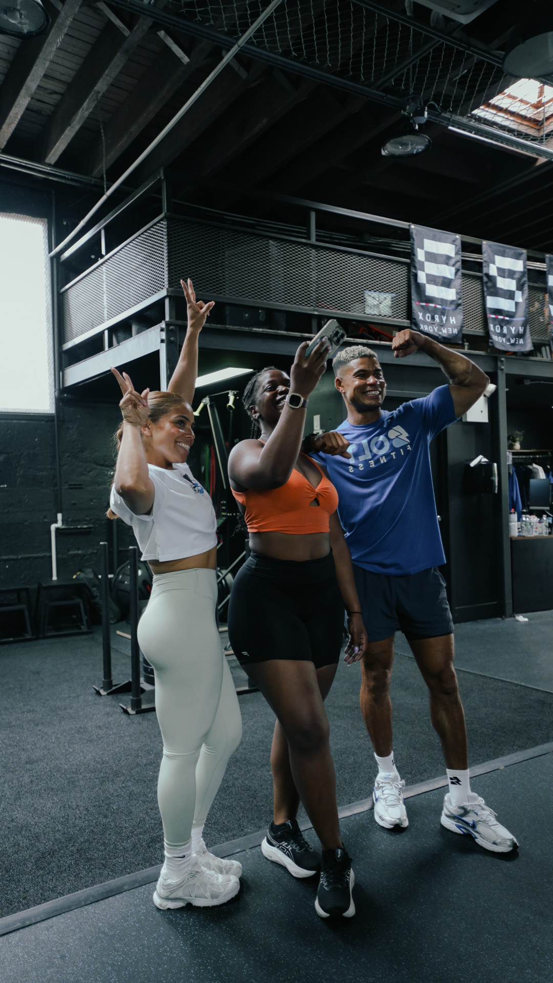 BOLT Fitness community together in the gym under HYROX New York banners