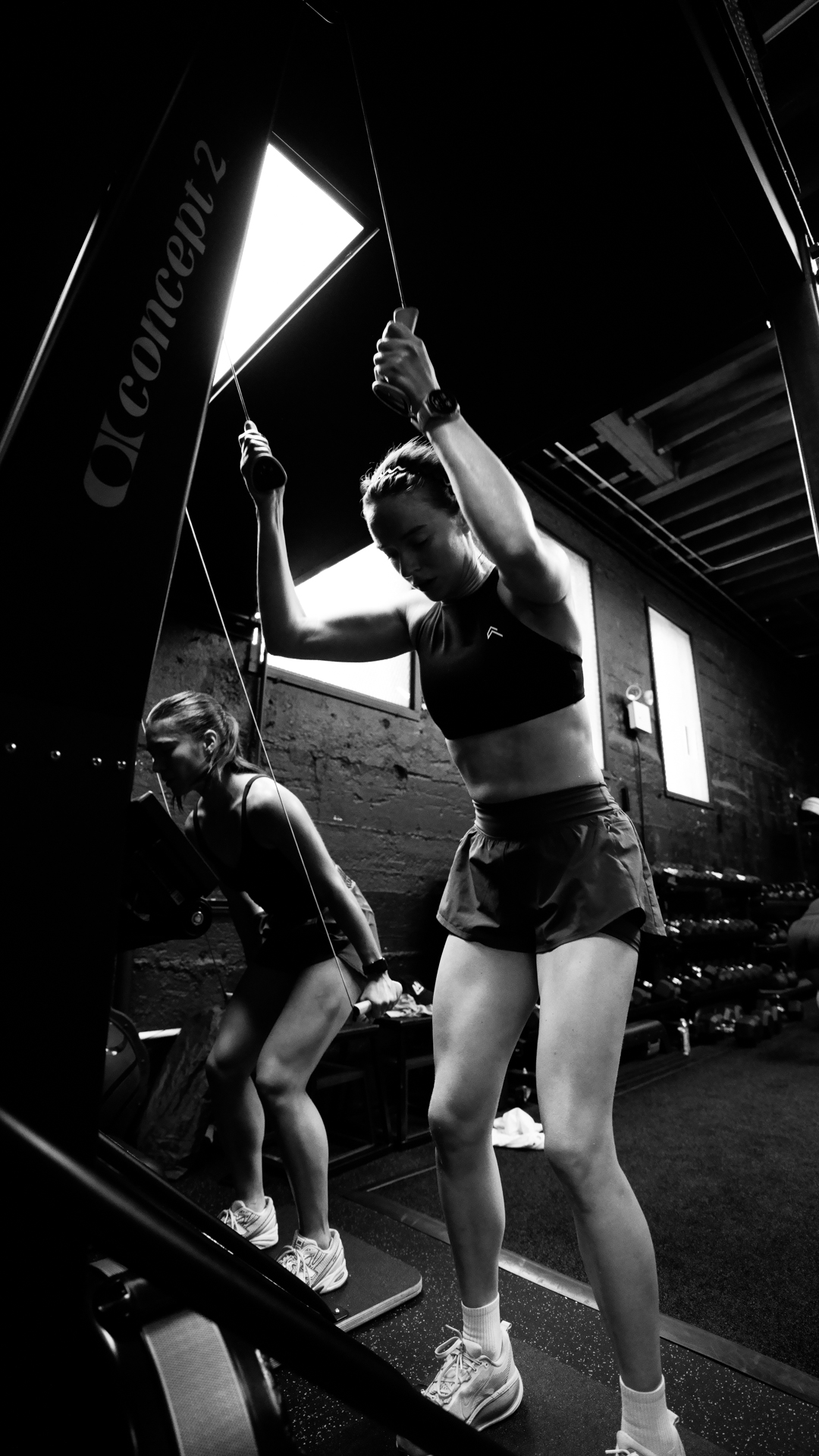 Athletes on the SkiErg during a BOLT Fitness class